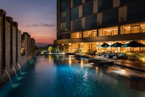 Outdoor pool, pool umbrellas, pool loungers
