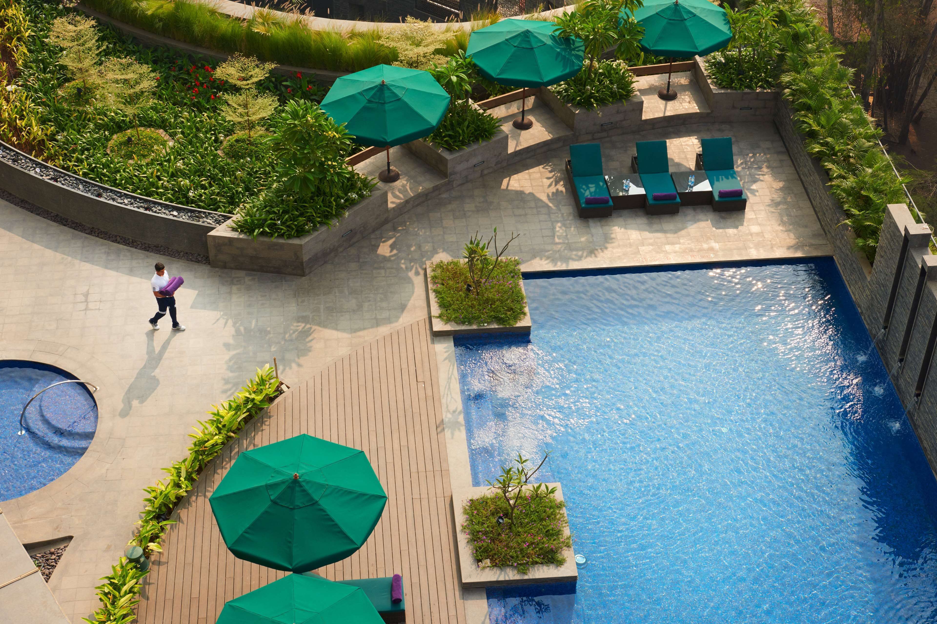 Outdoor pool, free pool cabanas, pool umbrellas