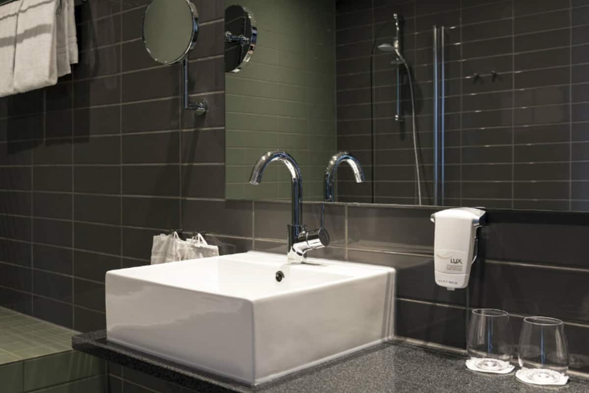 hair dryer, towels, soap, shampoo