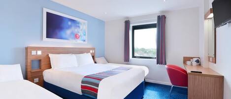 A hotel room with two beds, a desk, a chair, a TV, and a window with curtains.