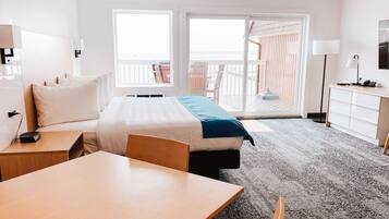 Premium Studio, 1 King Bed, Kitchenette, Lake View | Premium bedding, pillow-top beds, minibar, desk