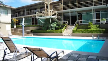 Outdoor pool, pool umbrellas, sun loungers