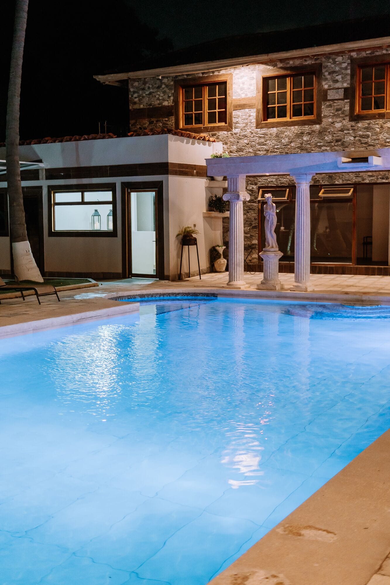 outdoor pool, pool umbrellas, pool loungers