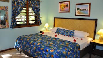 Romantic Bungalow, 1 King Bed | Pillowtop beds, minibar, in-room safe, iron/ironing board