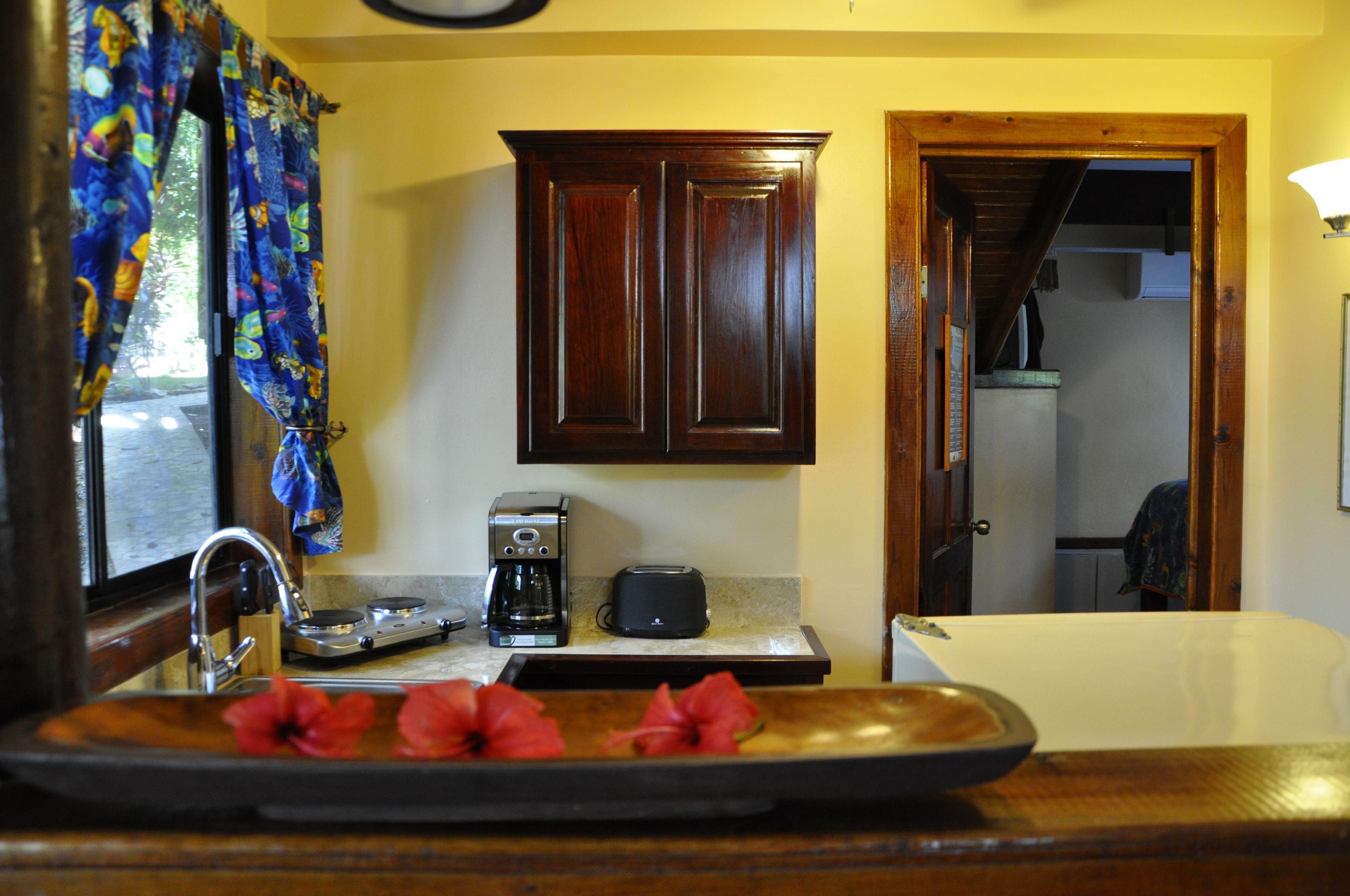 royal bungalow | private kitchen | full-sized fridge, microwave, blender, coffee grinder