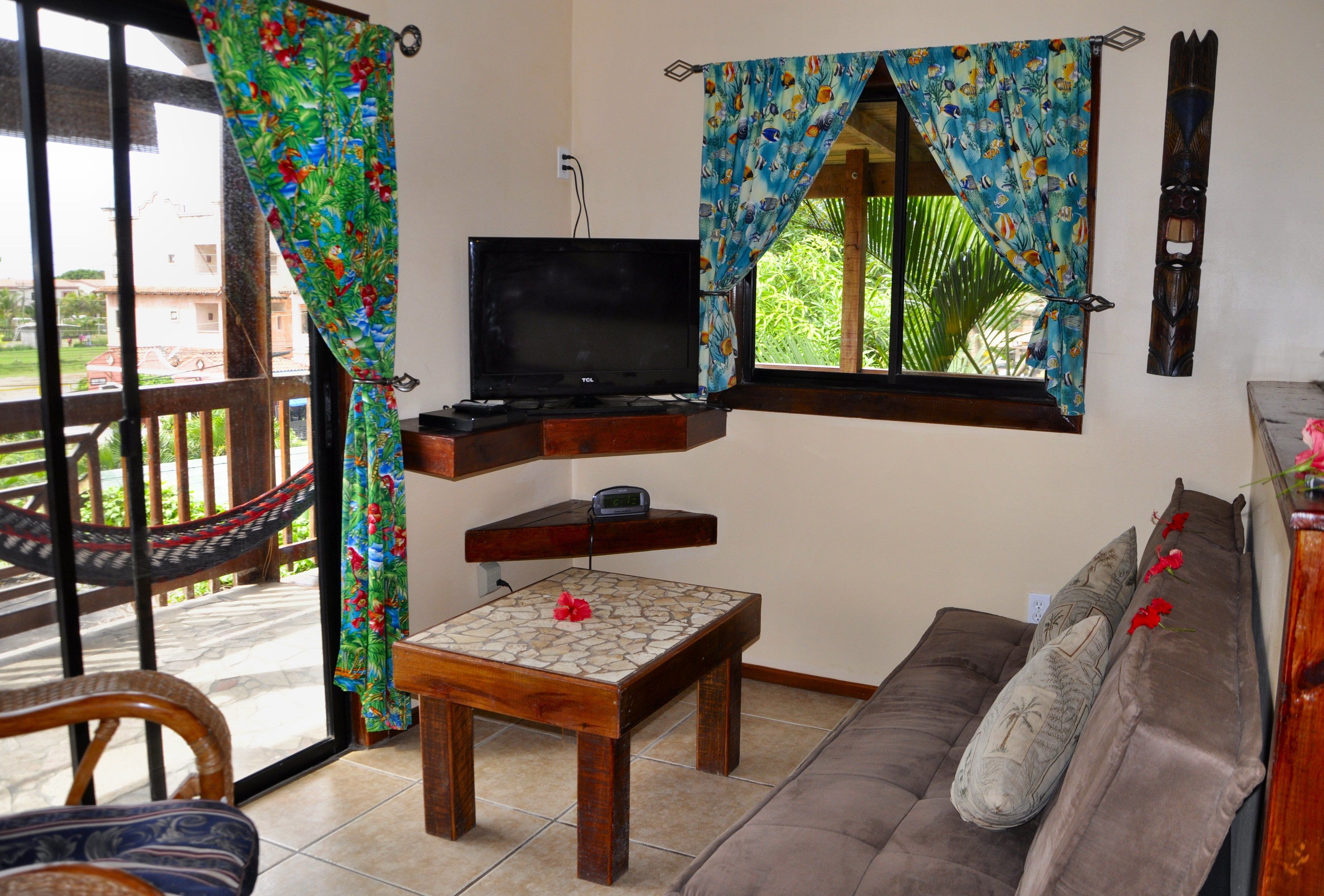 royal bungalow | living area | flat-screen tv