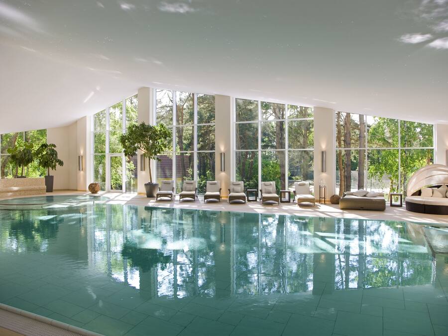 Indoor pool, open 7:00 AM to 9:00 PM, sun loungers