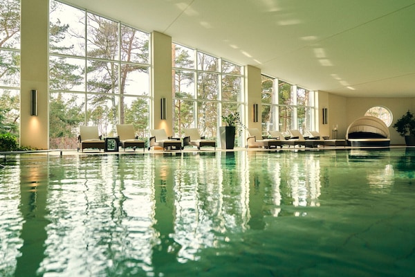 Indoor pool, open 7:00 AM to 9:00 PM, sun loungers