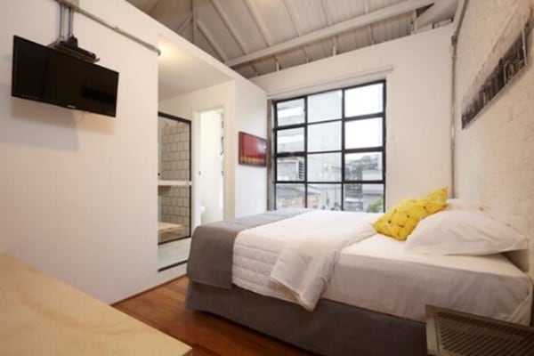 Habitación de lujo con 1 cama doble o 2 individuales | Minibar, caja fuerte, cortinas opacas y tabla de planchar con plancha