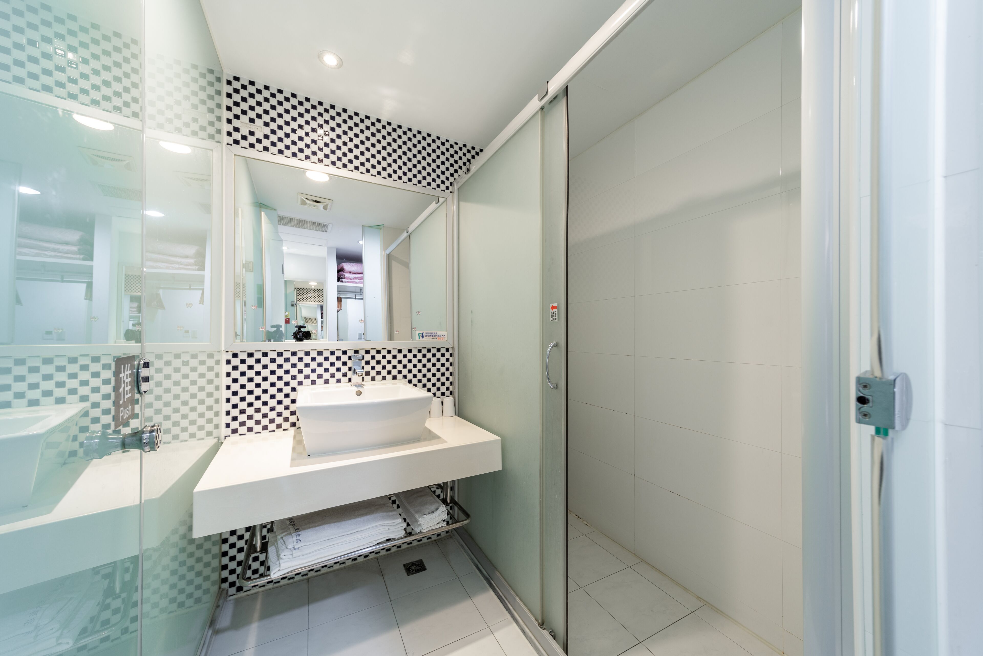 deluxe quadruple room | bathroom | free toiletries, hair dryer, slippers, towels