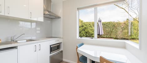 Studio, Accessible | Private kitchenette | Microwave, stovetop, electric kettle, cookware/dishes/utensils