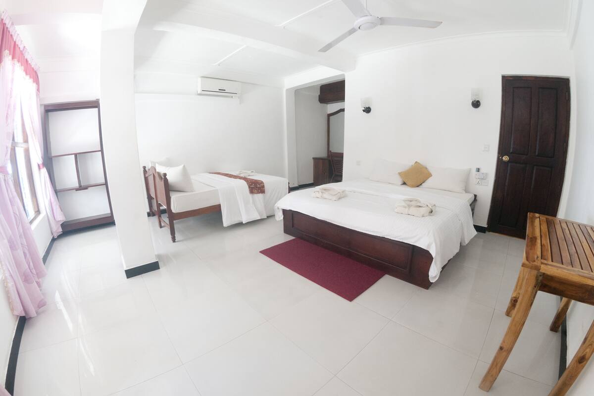 Family Room, 1 Bedroom, Sea View | 1 bedroom, in-room safe, desk, soundproofing