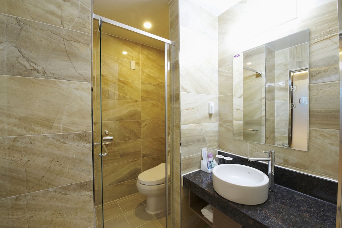 family suite | bathroom | free toiletries, hair dryer, bathrobes, slippers