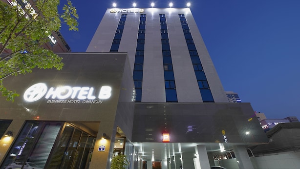 A modern hotel building with a prominent sign for 'HOTEL B' and 'BUSINESS HOTEL GWANGJU'. - Hotel B (Gwangju)