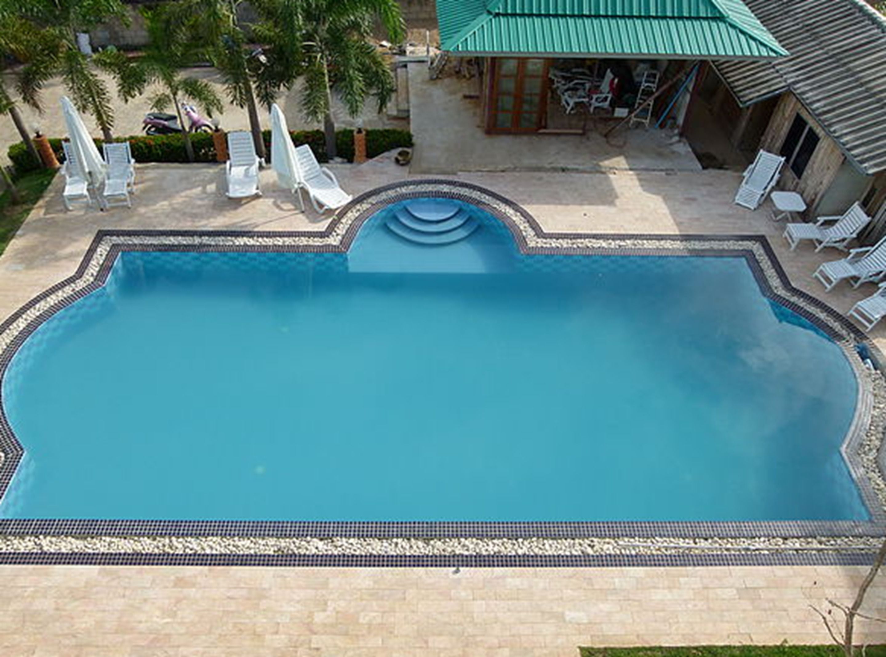 outdoor pool, pool umbrellas, pool loungers