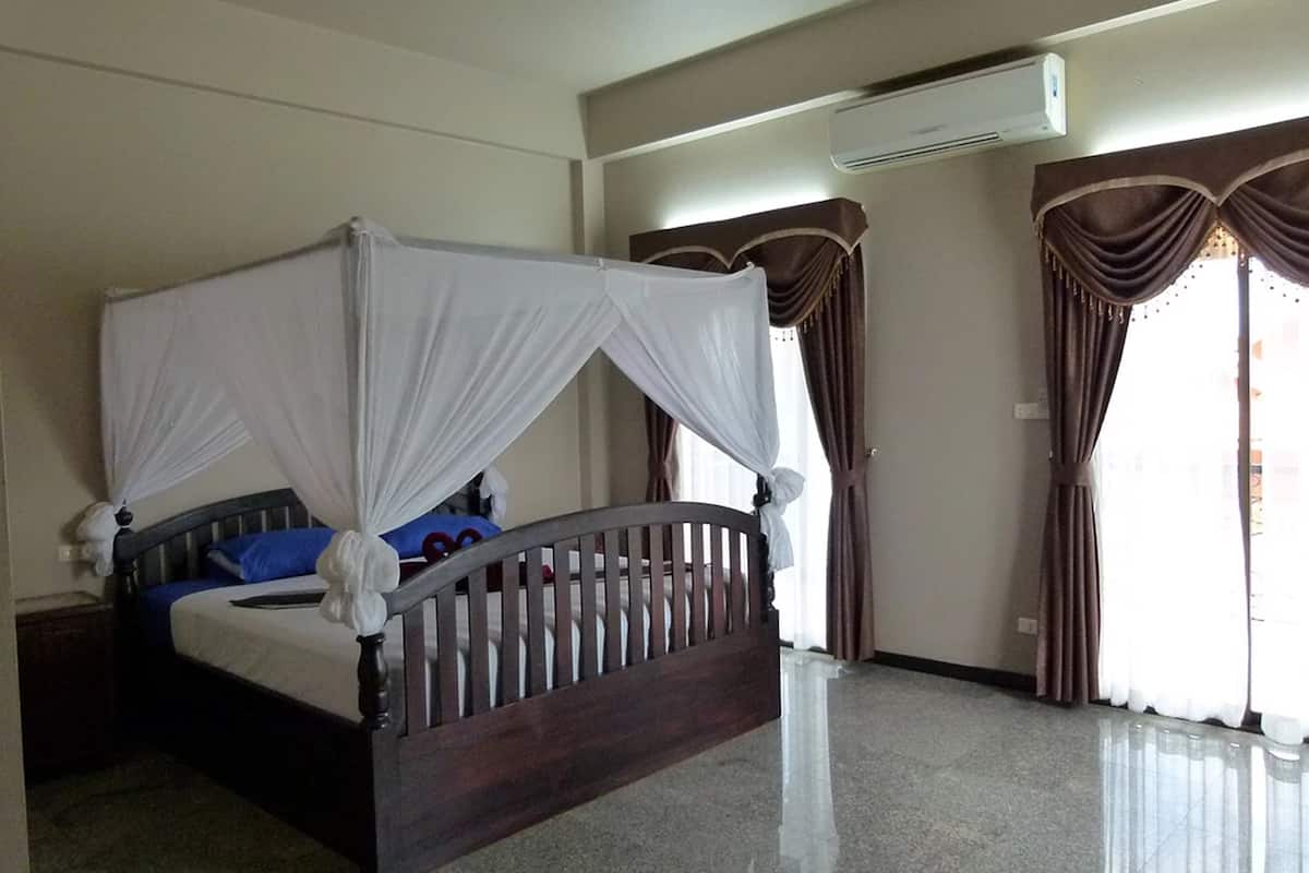 deluxe double room | in-room safe, desk, blackout curtains, free cots/infant beds