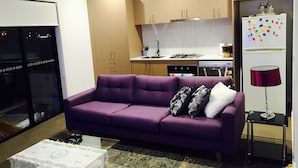 Two Bedroom Apartment | Living area | Flat-screen TV