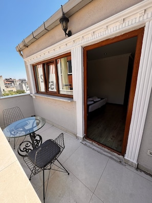 Deluxe kamer, balkon, uitzicht op stad | Balkon