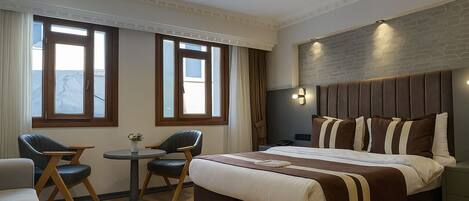 Egyptian cotton sheets, premium bedding, minibar, in-room safe