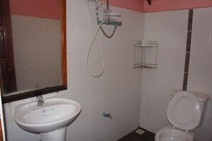 Shower, free toiletries, slippers