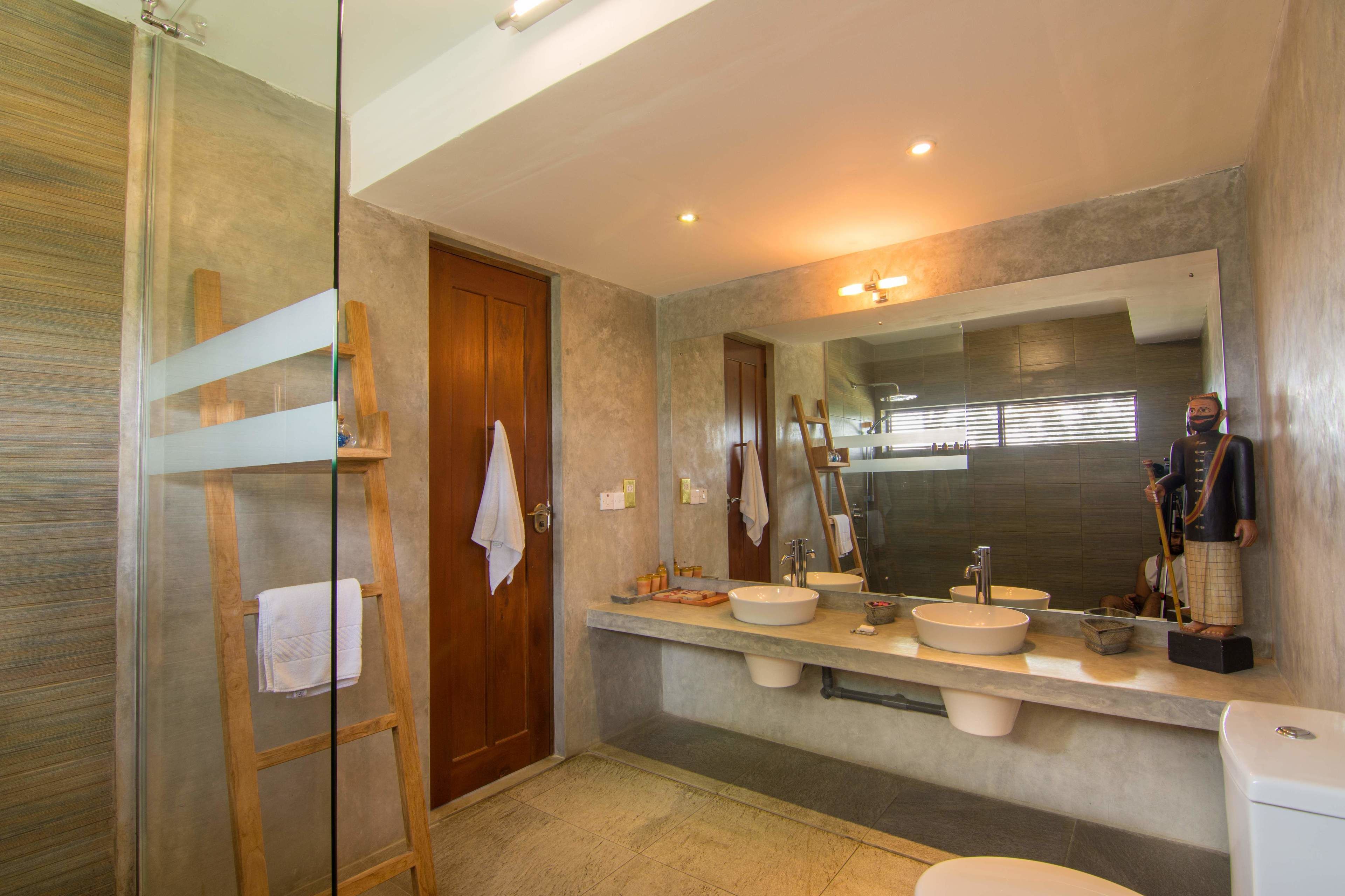 deluxe room (lemongrass) | bathroom | shower, rainfall showerhead, designer toiletries, hair dryer