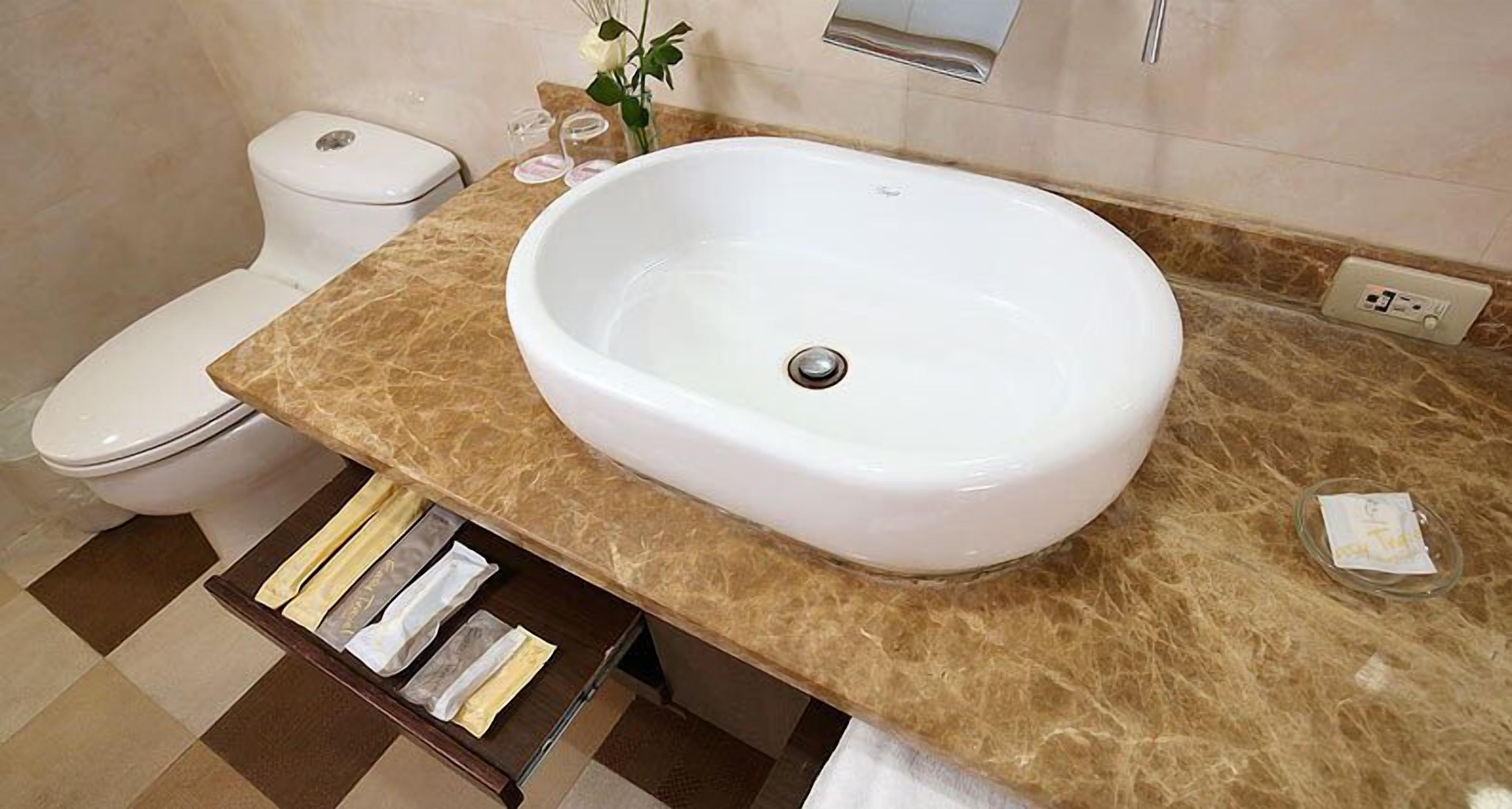 free toiletries, hair dryer, slippers, towels