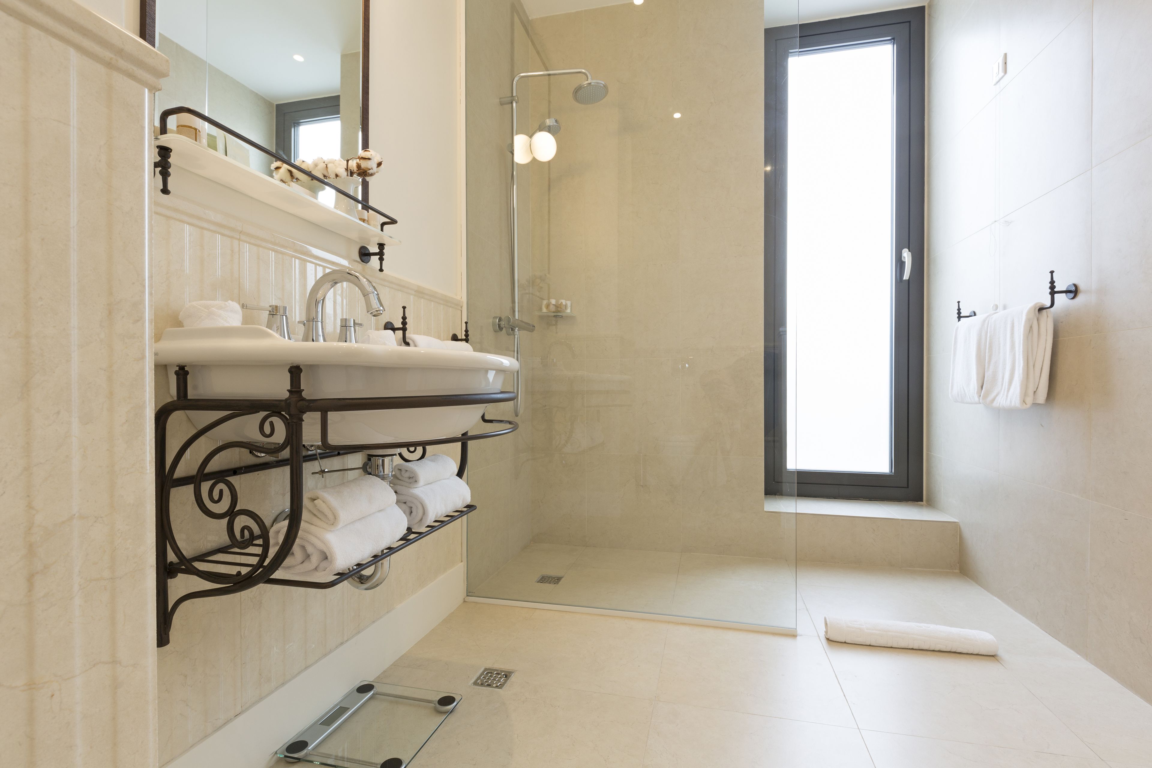 executive suite  | bathroom | shower, designer toiletries, hair dryer, bathrobes