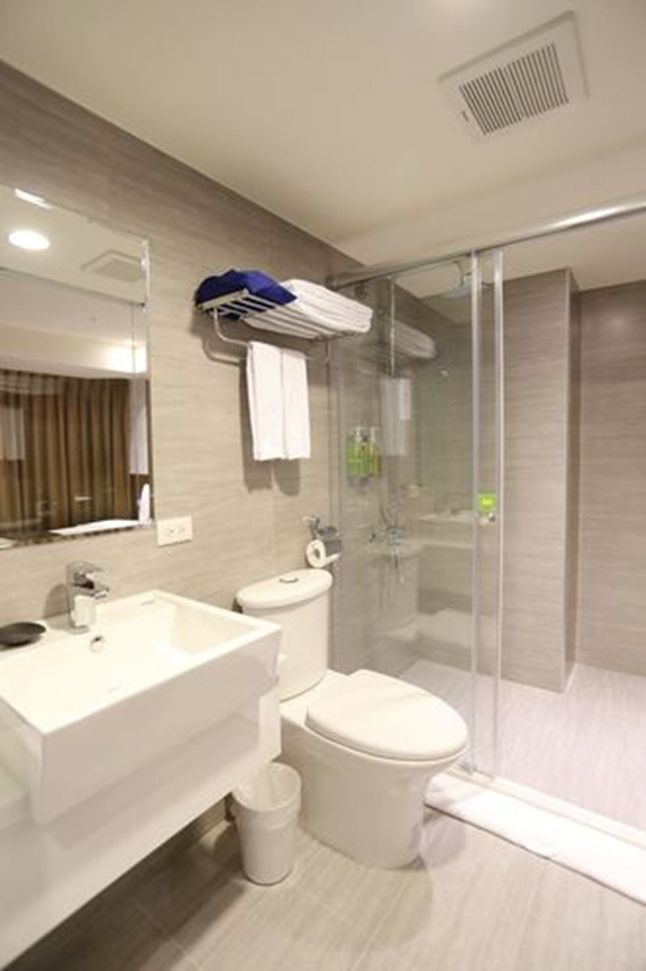 shower, free toiletries, hair dryer, slippers