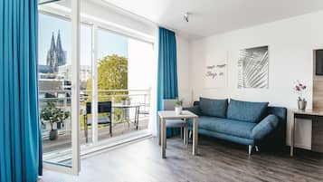 Superior Apartment Cathedral View | Living area | Flat-screen TV
