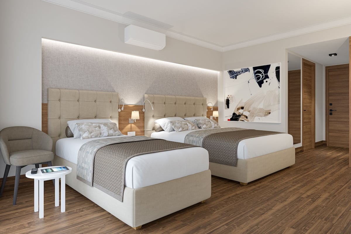 Minibar, desk, cribs (free), WiFi (surcharge)