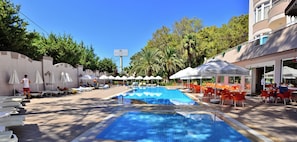 Outdoor pool, pool umbrellas, pool loungers