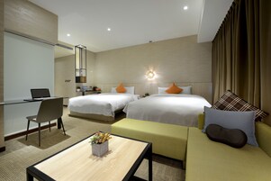 Deluxe Quadruple Room | In-room safe, iron/ironing board, free WiFi, bed sheets