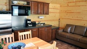 Deluxe Cabin (Chilliwack) | Living area | Flat-screen TV - Toronto West KOA (Milton)
