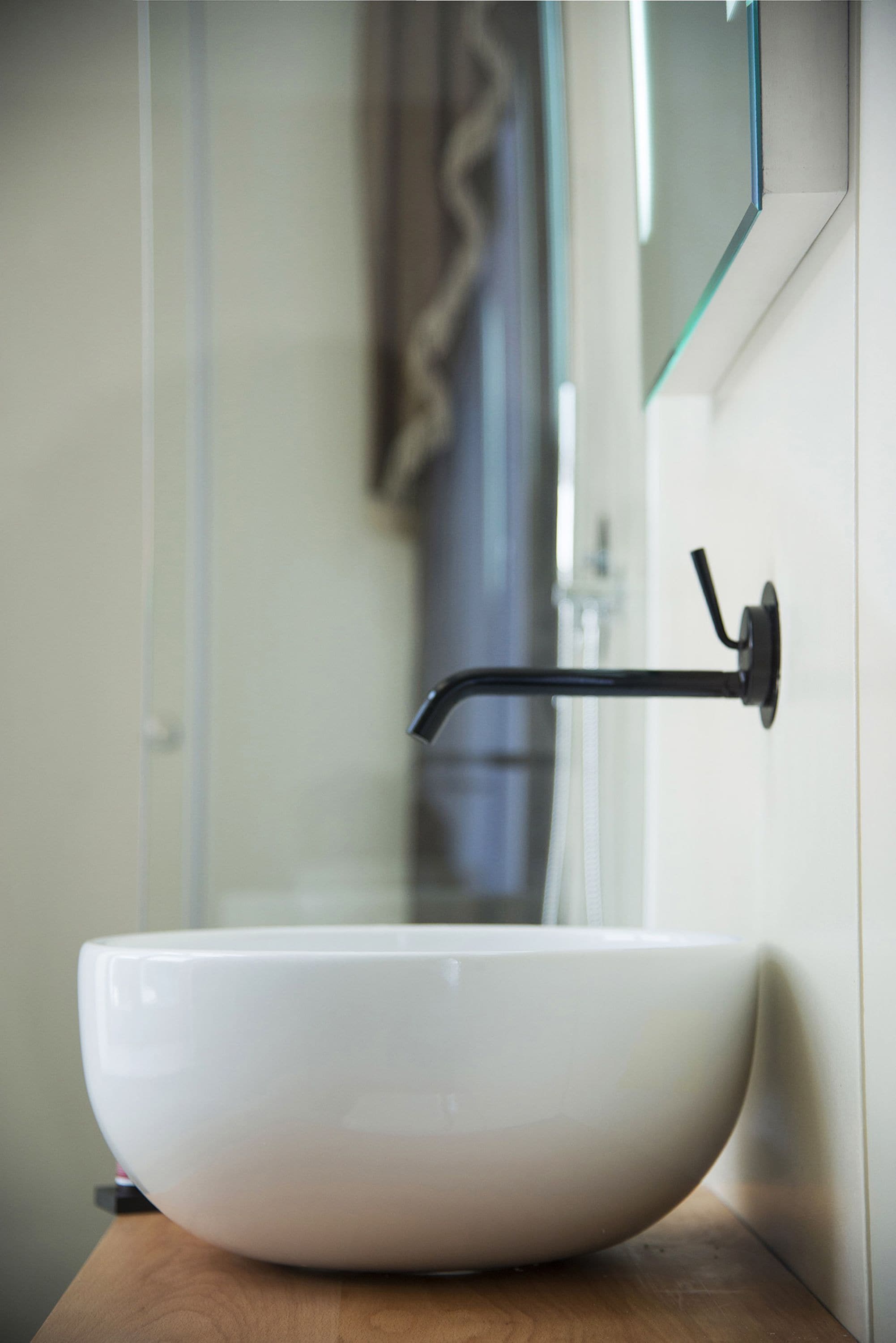 designer toiletries, hair dryer, towels, soap