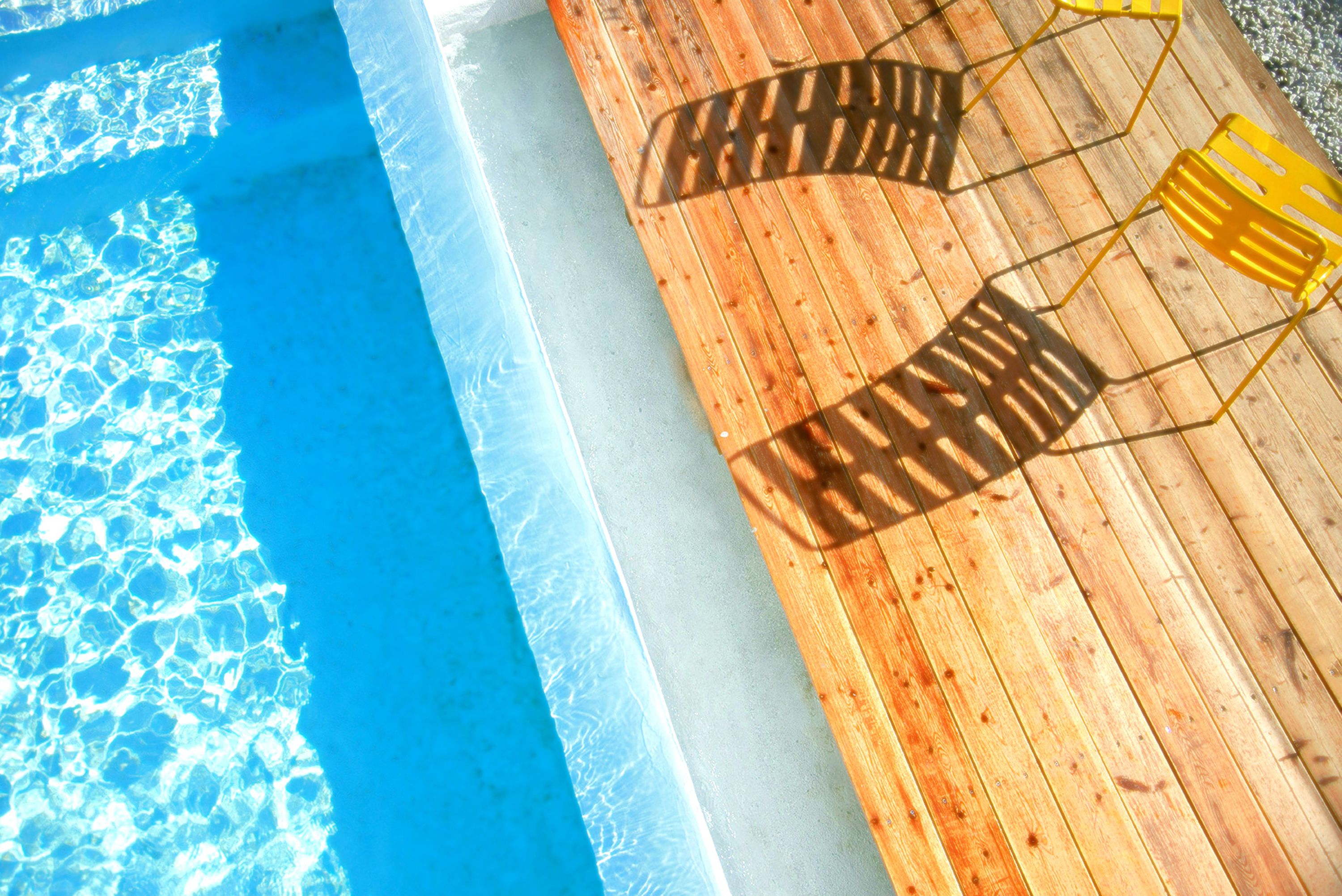 outdoor pool, open 11:00 am to 7:00 pm, pool loungers