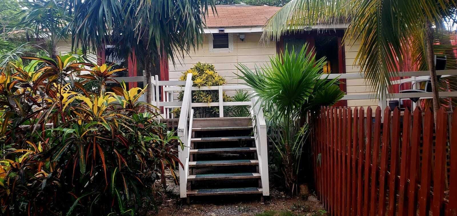 basic bungalow, multiple beds, garden view | terrace/patio