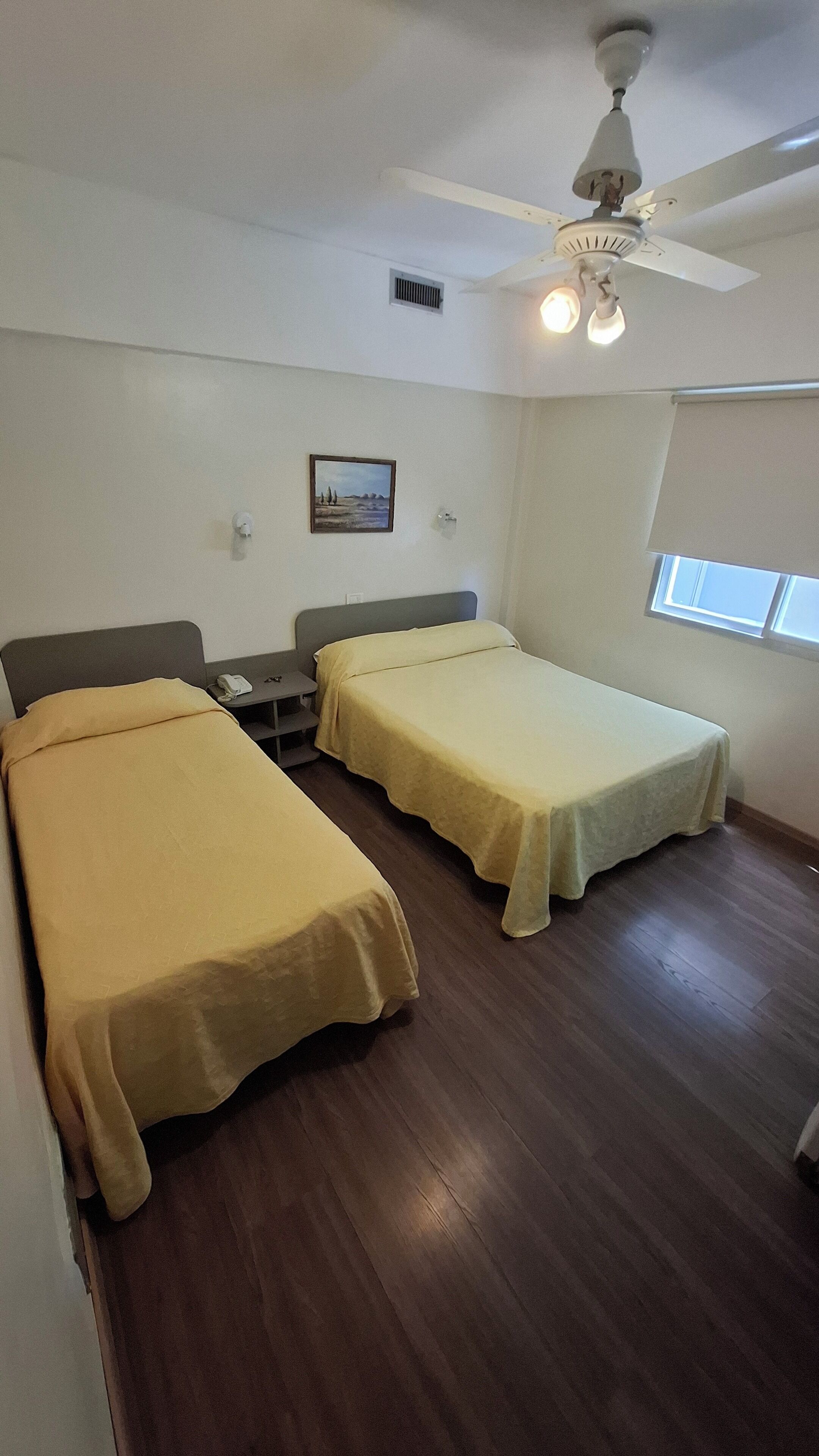 Triple Room, Multiple Beds | Minibar, in-room safe, free WiFi, bed sheets