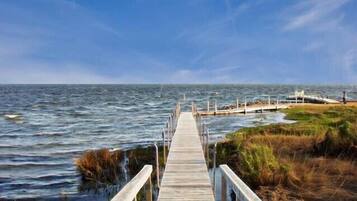 Private beach, beach umbrellas, beach towels, surfing