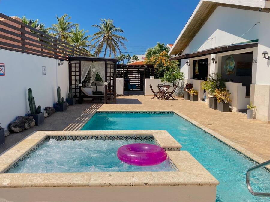 Outdoor pool, open 9:00 AM to 9:00 PM, free pool cabanas, pool umbrellas