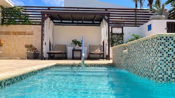 Outdoor pool, free cabanas, pool umbrellas