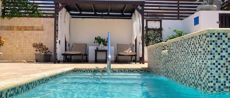 Outdoor pool, open 9:00 AM to 9:00 PM, free pool cabanas, pool umbrellas