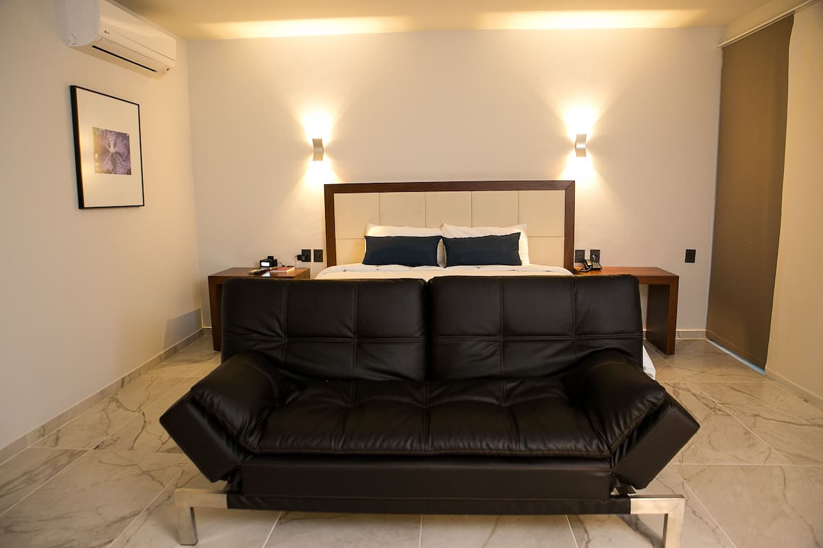Executive Room, Multiple Bedrooms, Balcony, Pool View | 1 bedroom, desk, iron/ironing board, free cribs/infant beds