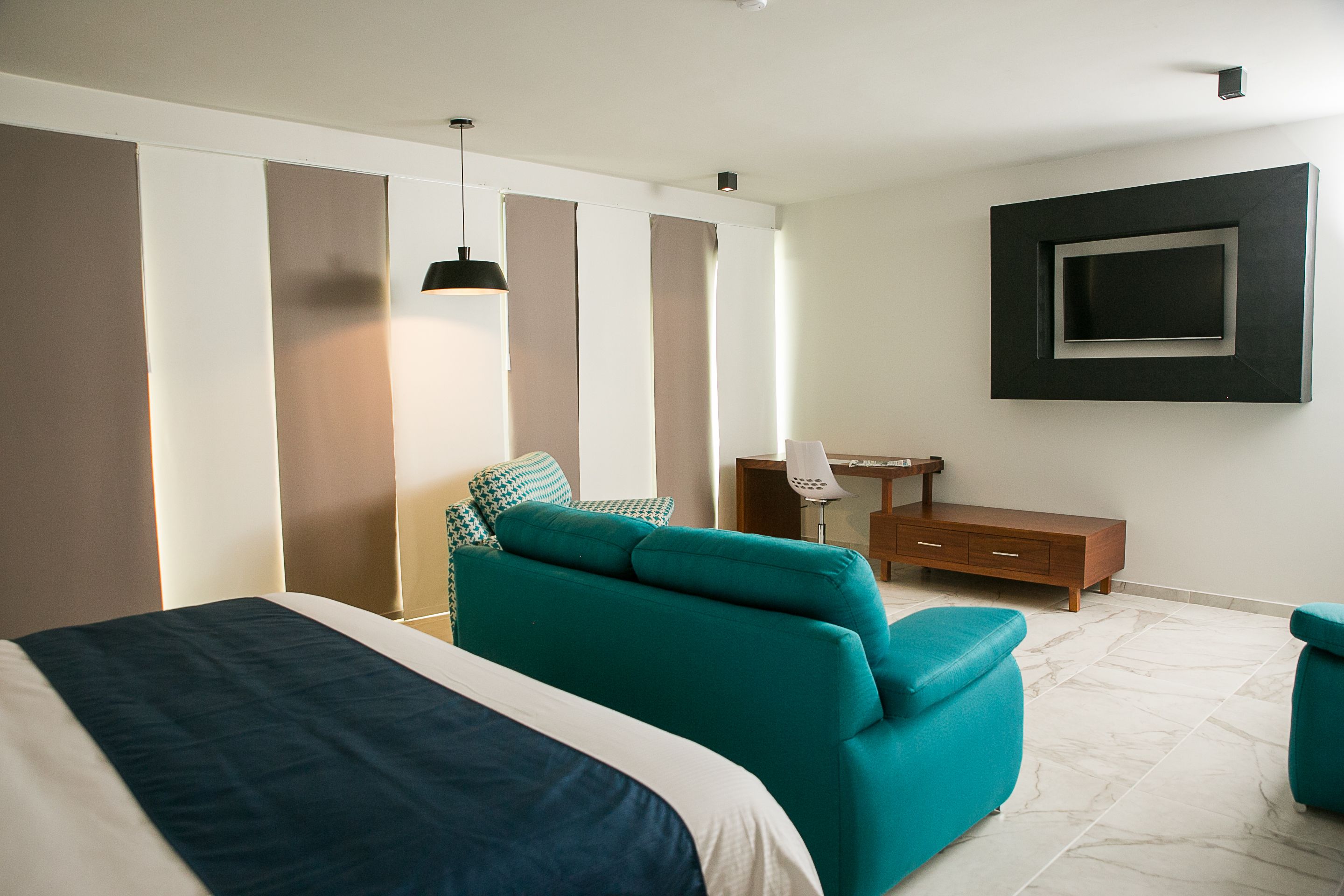 junior suite, 1 king bed, balcony, pool view | 1 bedroom, desk, iron/ironing board, free cots/infant beds
