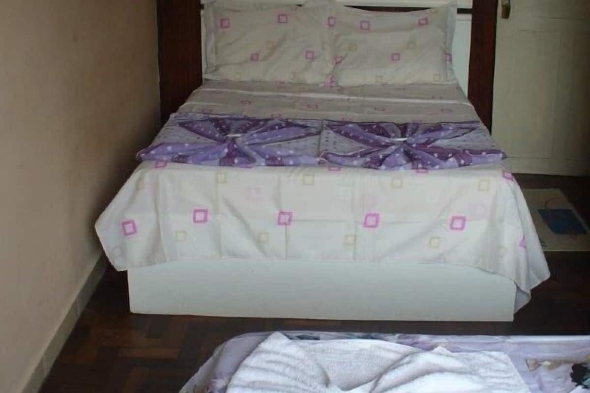 Desk, blackout curtains, free WiFi, bed sheets