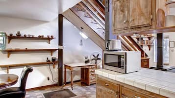 Yosemite's Creekside Birdhouse, Loft - 2697 Spelt Road, Wawona, CA | Living area | TV, fireplace