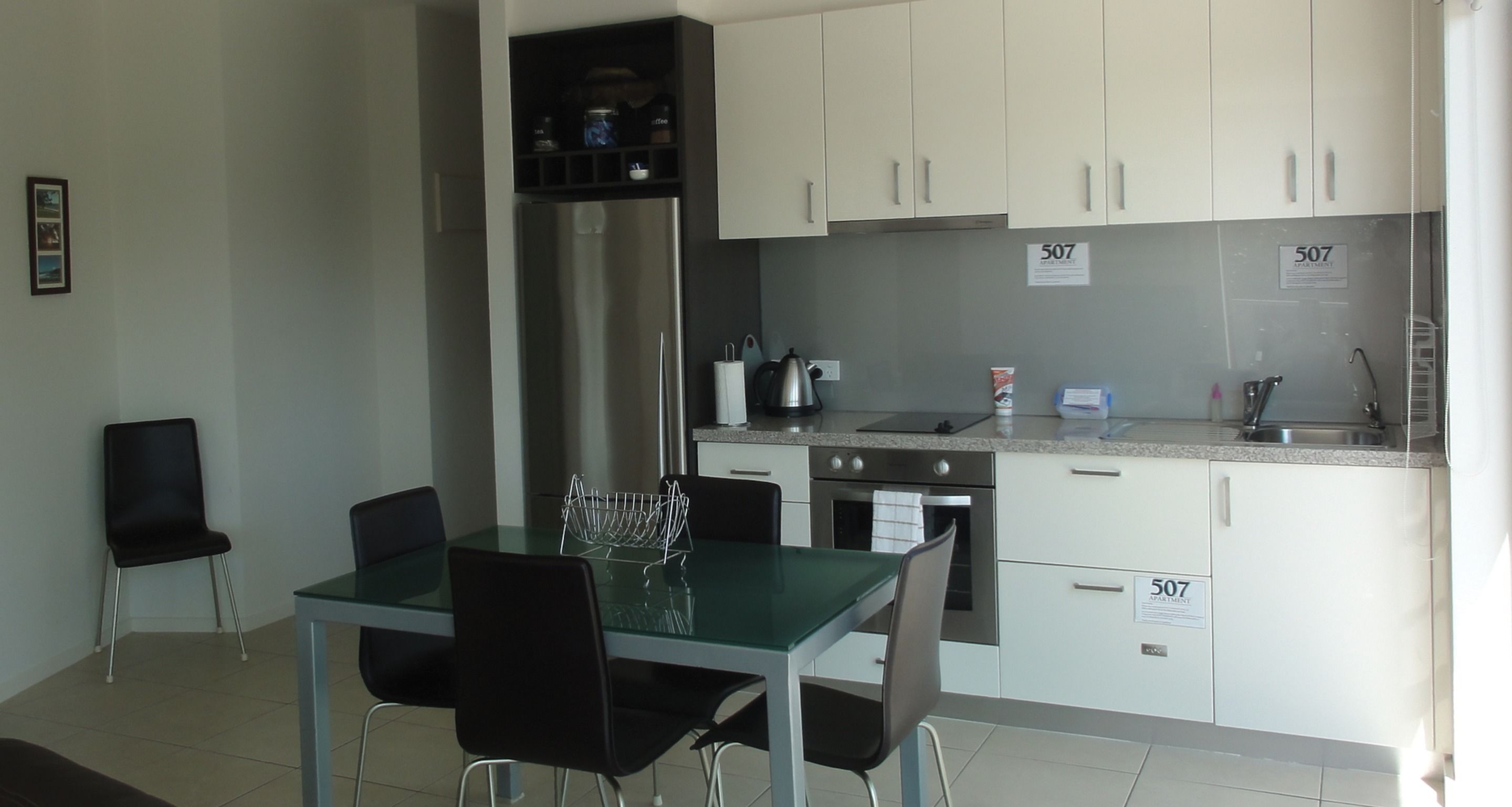 Executive Apartment, 2 Bedrooms, Balcony, Partial Ocean View | Private kitchen | Full-sized fridge, microwave, stovetop, dishwasher