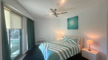 Executive Apartment, 2 Bedrooms, Balcony, Partial Ocean View | 2 bedrooms, premium bedding, iron/ironing board, free WiFi