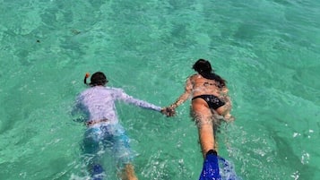 On the beach, scuba diving, snorkelling, kayaking