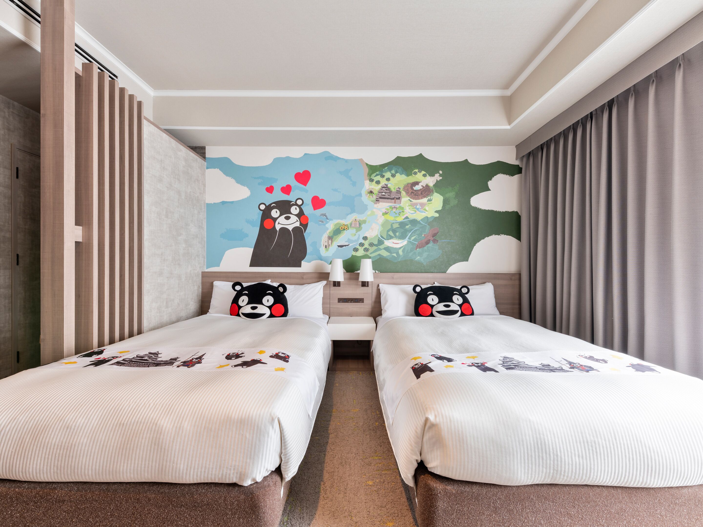 A hotel room with two beds, a mural on the wall, and a view of the outdoors.