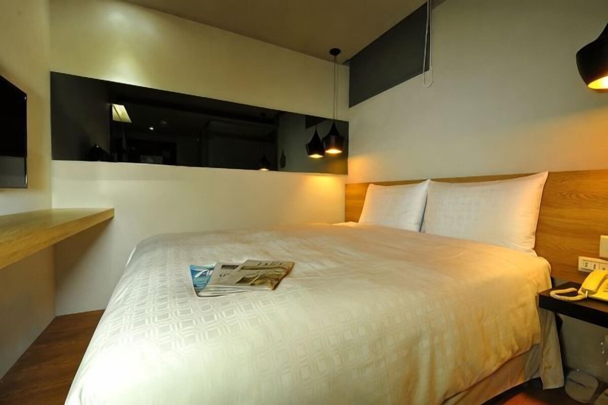 Down comforters, desk, iron/ironing board (on request), WiFi (free)